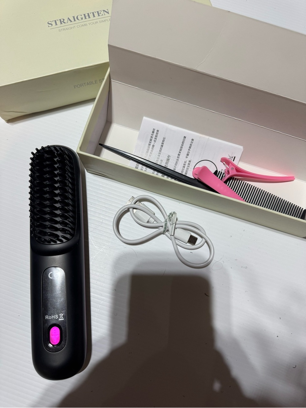 Black Heated Hair Straightening Brush with Pink Clips